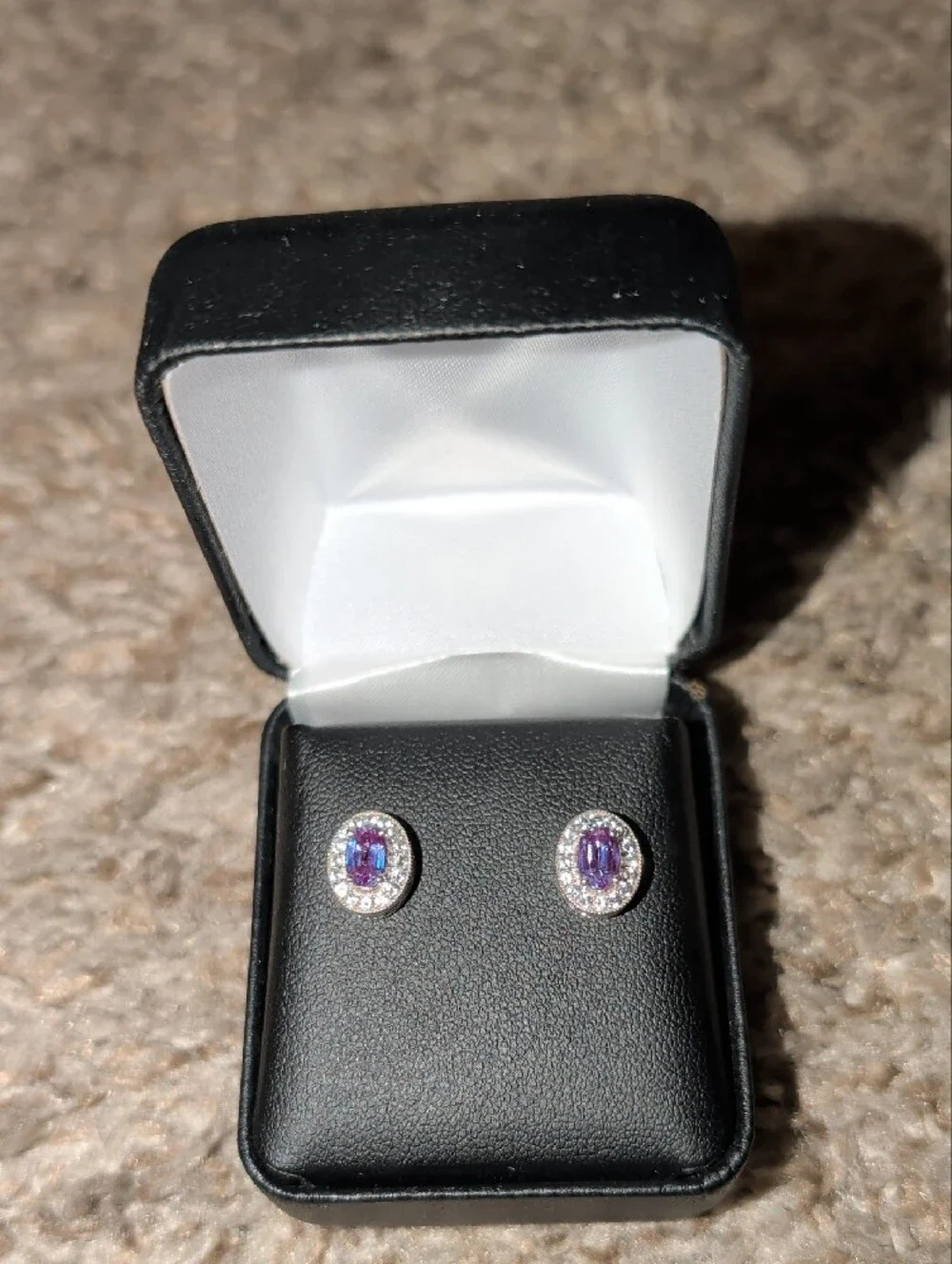 Sterling Silver Oval Blue Halo Stud Earrings